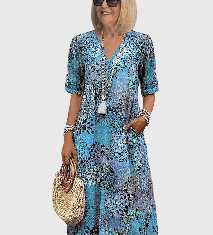 Bella | Elegantna Cvjetna Midi Haljina